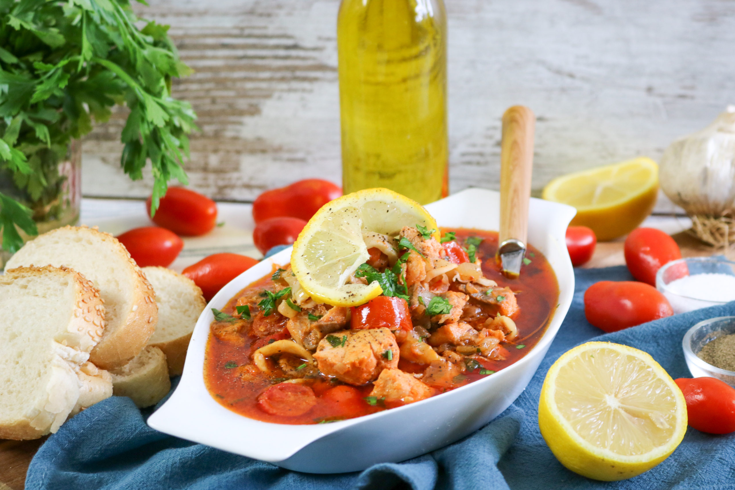 Tuscan Seafood Stew Adding Tomatoes Stir in Seafood