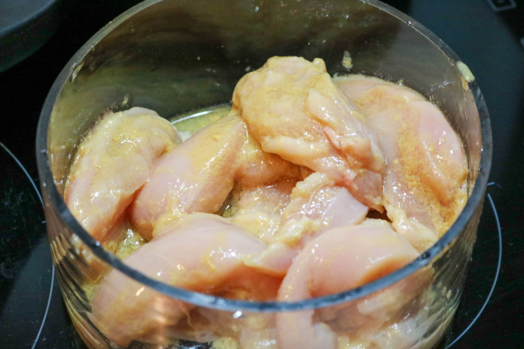 Place chicken in a plastic bag and pour in 3 tbsp. dressing
