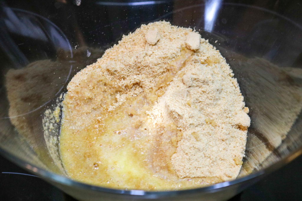 mix graham cracker crumbs and butter together