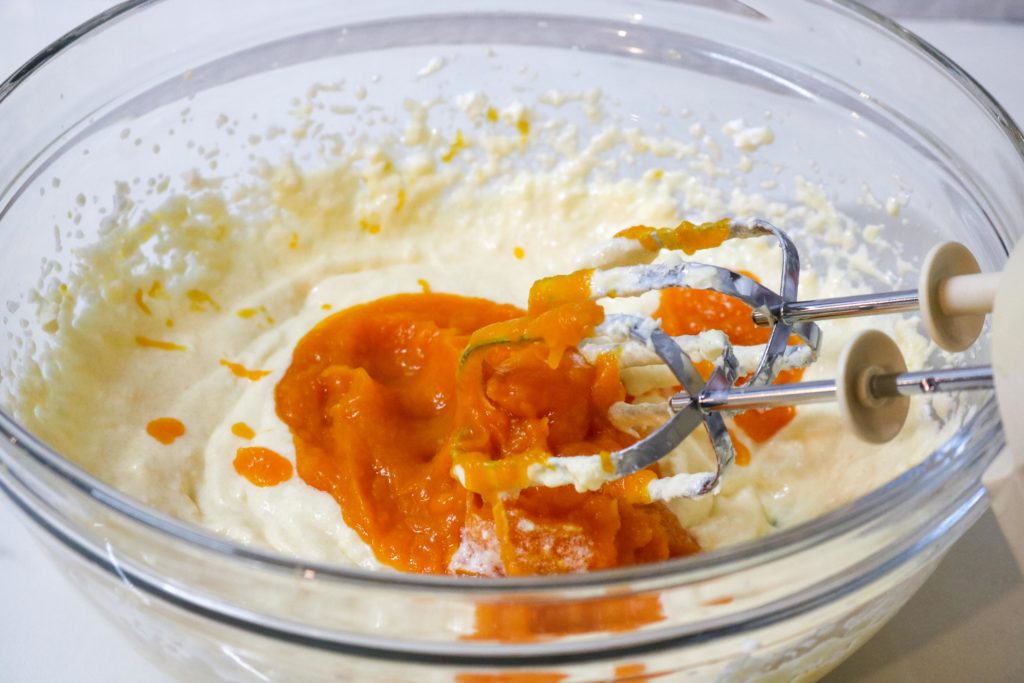 Mix in the egg, pumpkin puree, and vanilla