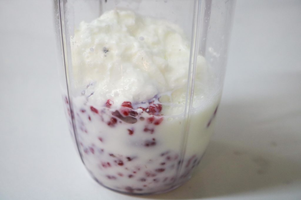 Put milk yogurt, ½ cup raspberries, vanilla and splenda in a blender. Puree