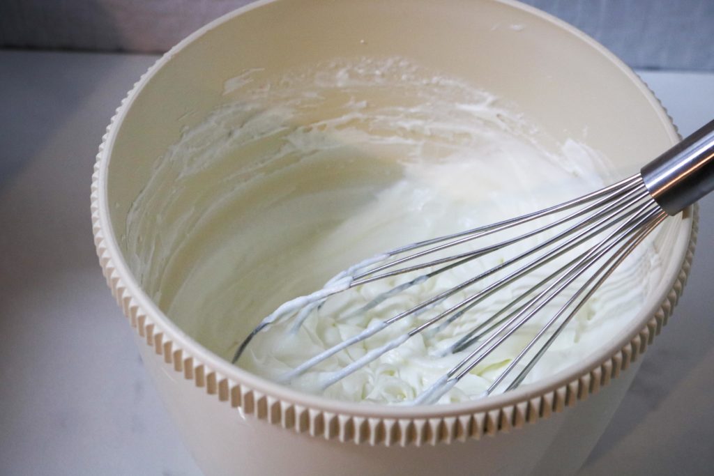 whisk in coconut creamer and egg substitute until smooth