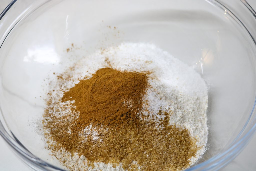 mix together all-purpose flour, whole wheat flour, sugar, sugar/stevia, baking powder, baking soda, salt and cinnamon