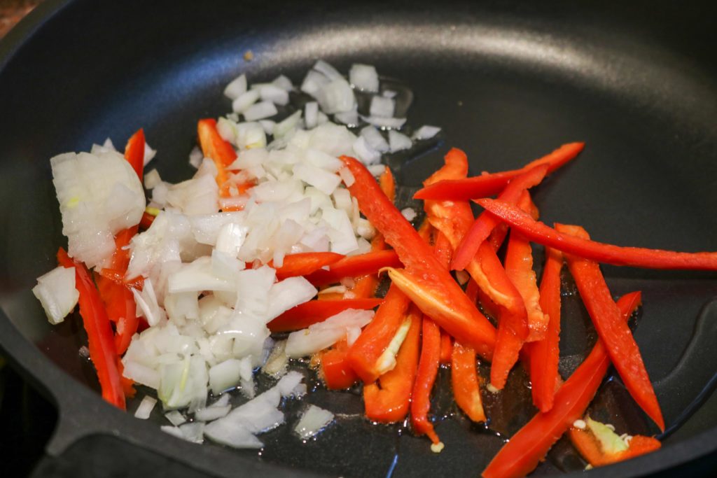Sauté onion and red pepper